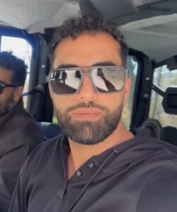 Commercial general contractor reviewing blueprints on a construction site